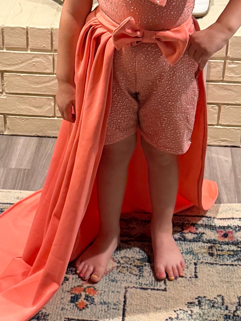Girls Coral Sequin Romper with Bow & Draped Train